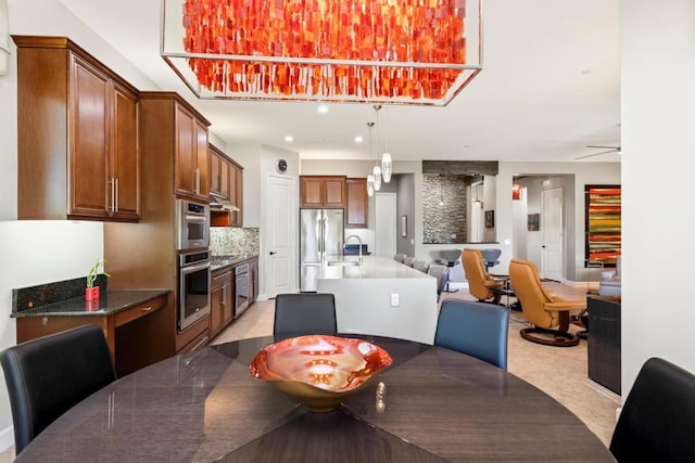 dining room featuring sink