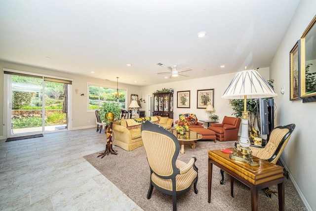 living room featuring ceiling fan