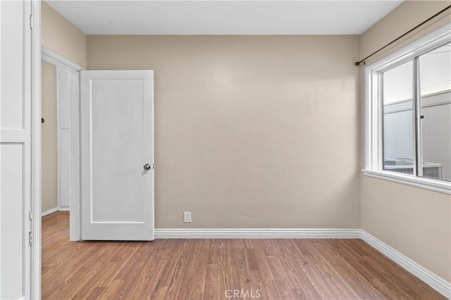 unfurnished bedroom featuring light hardwood / wood-style floors