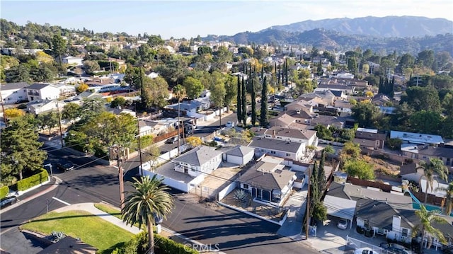 drone / aerial view featuring a mountain view