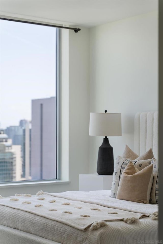 bedroom featuring multiple windows