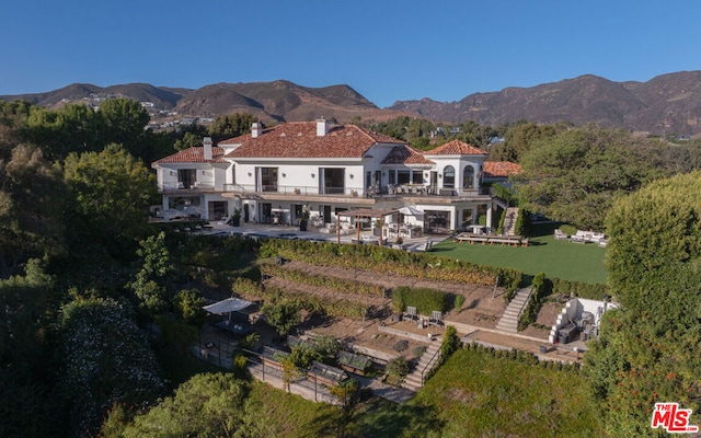 exterior space featuring a mountain view