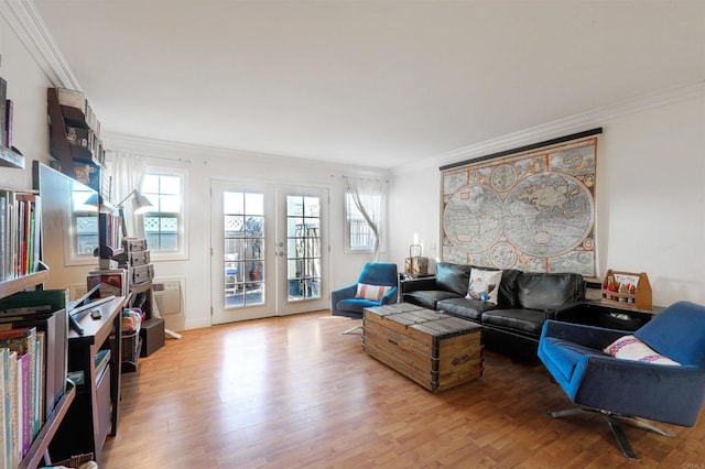 living room with hardwood / wood-style floors and crown molding