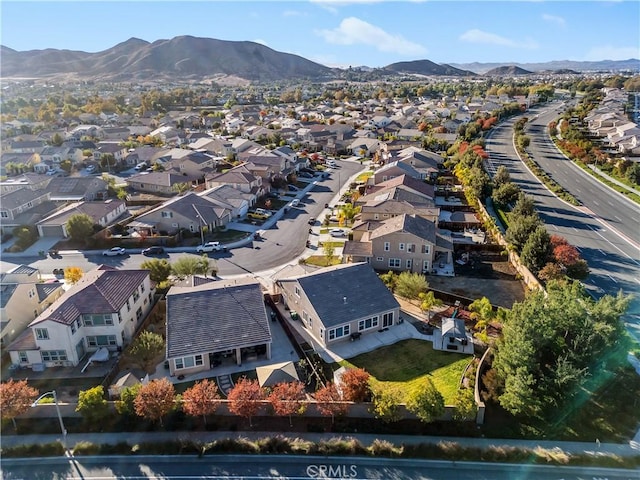 birds eye view of property featuring a mountain view