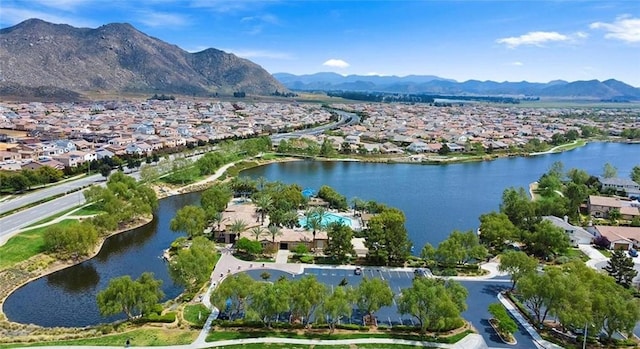 bird's eye view featuring a water and mountain view