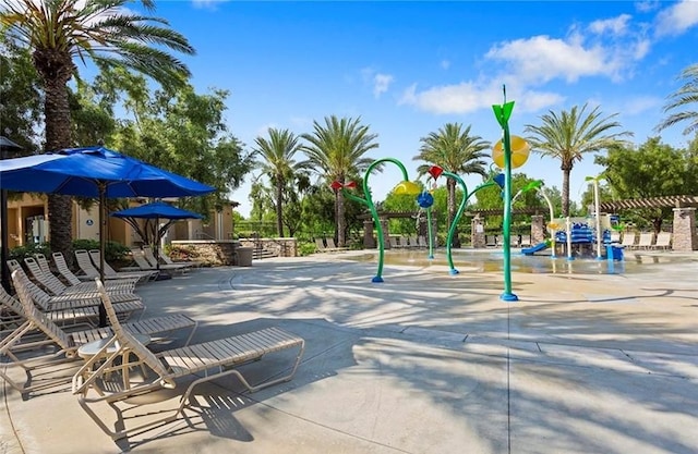 view of home's community with a playground