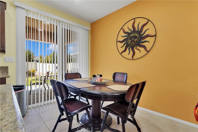 dining room with light tile patterned floors