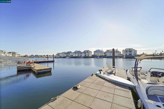 dock area with a water view