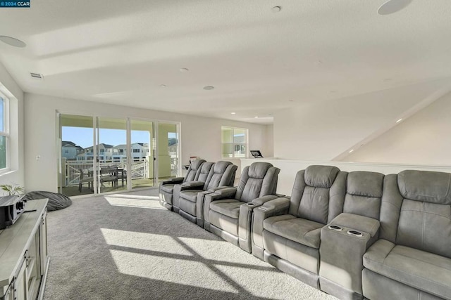 living room featuring light colored carpet