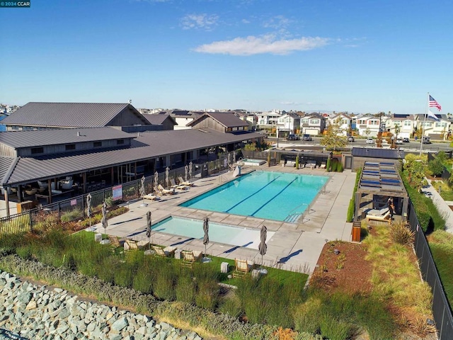 view of pool featuring a patio