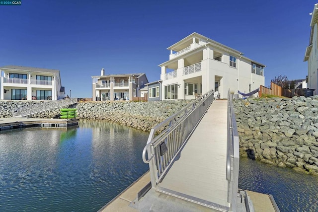 dock area with a water view