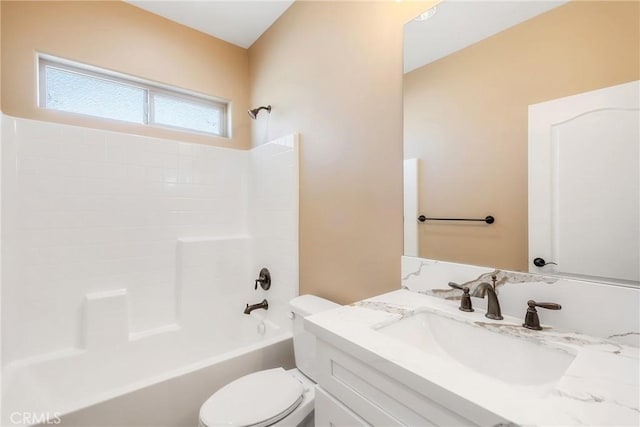 full bathroom featuring vanity,  shower combination, and toilet