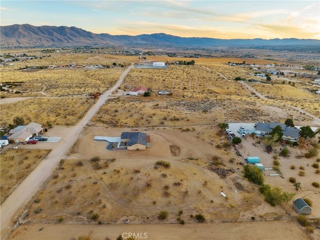 aerial view at dusk with a mountain view