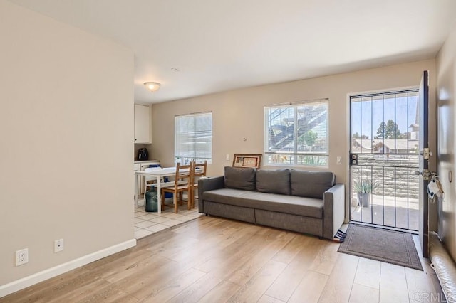 living room featuring light wood-type flooring