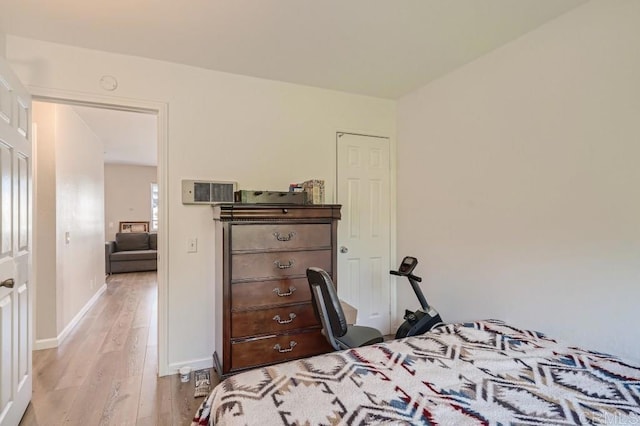 bedroom with light wood-type flooring