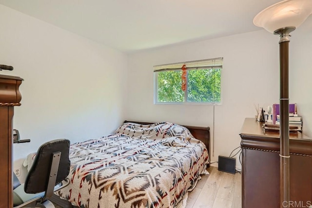 bedroom featuring light hardwood / wood-style floors