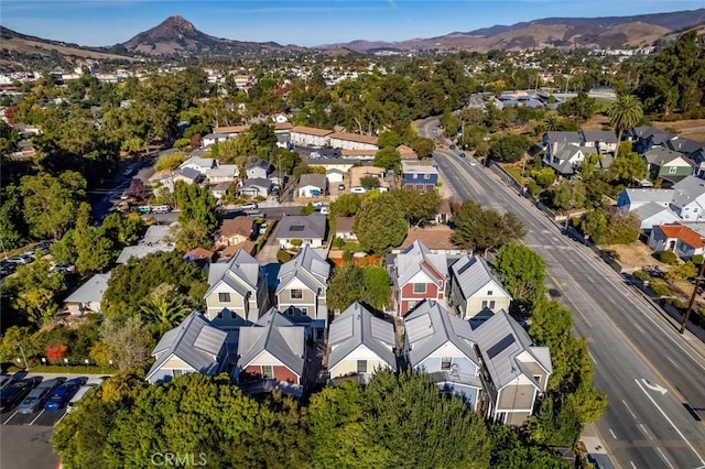 birds eye view of property with a residential view and a mountain view