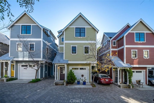 view of front of property with a garage and driveway