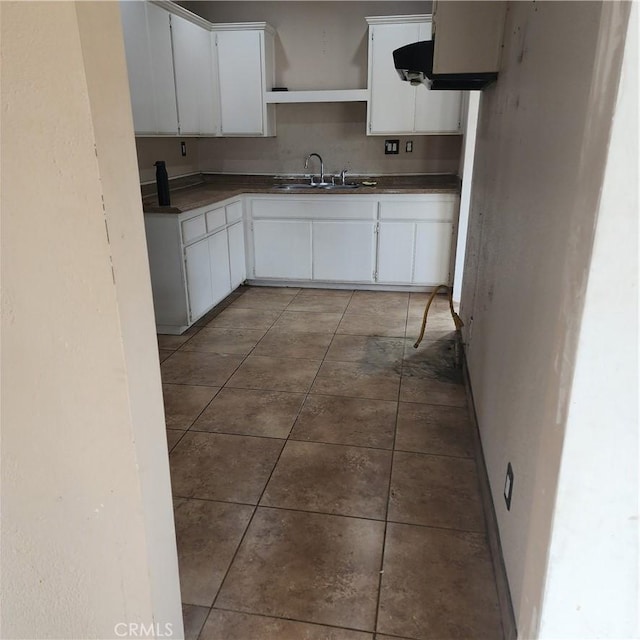 kitchen with sink and white cabinets