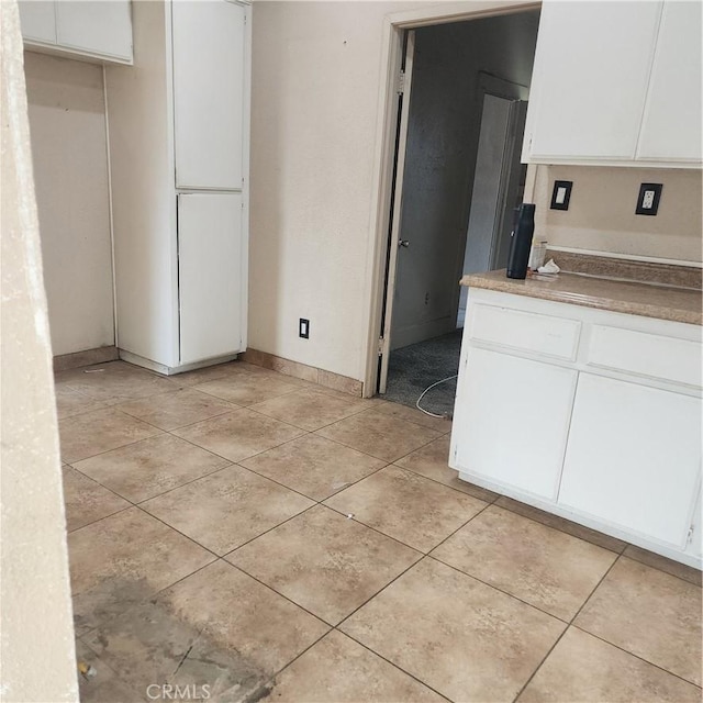 kitchen with white cabinetry