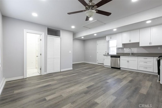 kitchen featuring ceiling fan, sink, stainless steel dishwasher, dark hardwood / wood-style floors, and white cabinets