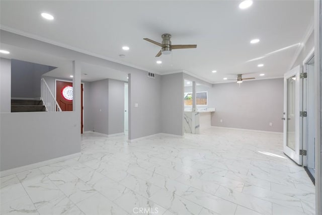 unfurnished living room featuring crown molding and ceiling fan