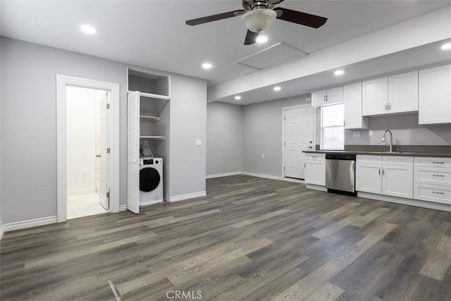 kitchen featuring washer / clothes dryer, dishwasher, white cabinets, and dark wood-type flooring