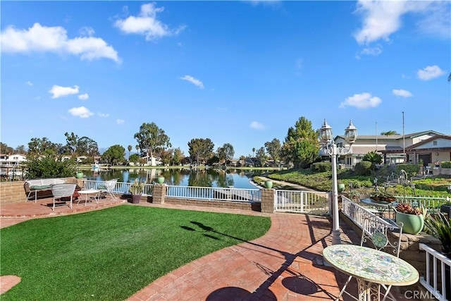 view of patio / terrace with a water view