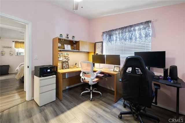 office area with ceiling fan and light hardwood / wood-style flooring