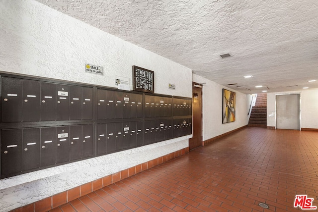 view of home's community featuring a mail area