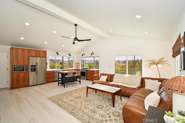 living room with beam ceiling, high vaulted ceiling, light hardwood / wood-style flooring, and ceiling fan