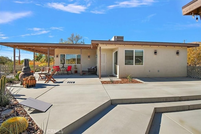 rear view of house featuring a patio