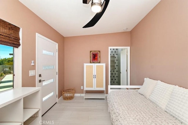 bedroom with ceiling fan and lofted ceiling