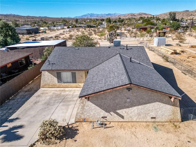 drone / aerial view featuring a mountain view