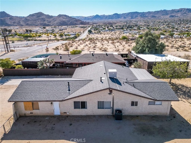 drone / aerial view featuring a mountain view