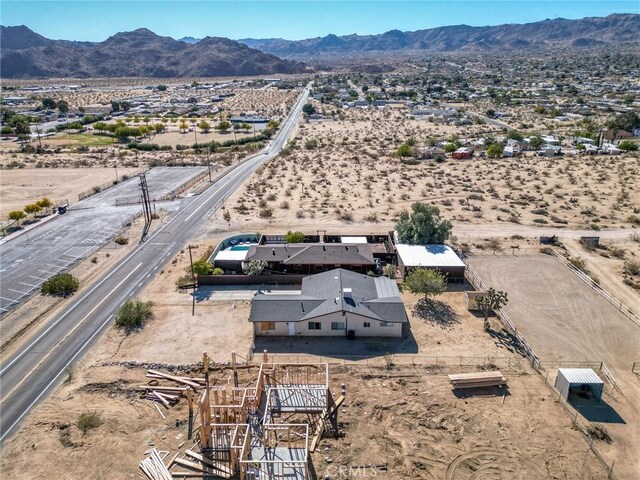 drone / aerial view featuring a mountain view