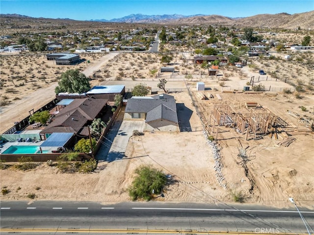 drone / aerial view featuring a mountain view