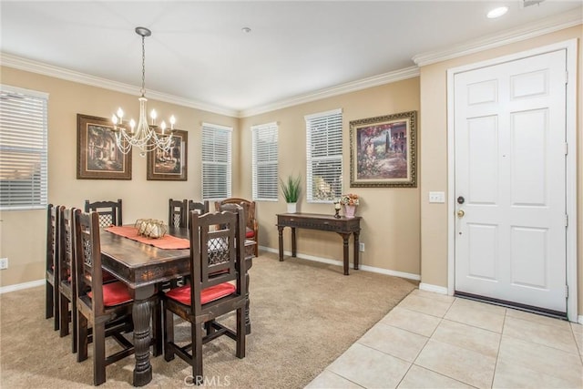 carpeted dining space with a notable chandelier and ornamental molding