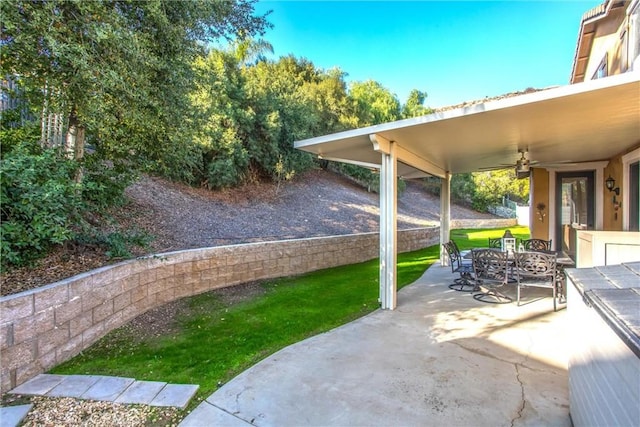 view of patio featuring ceiling fan