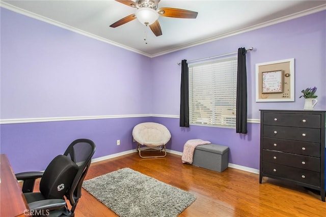 home office featuring hardwood / wood-style flooring, ceiling fan, and ornamental molding