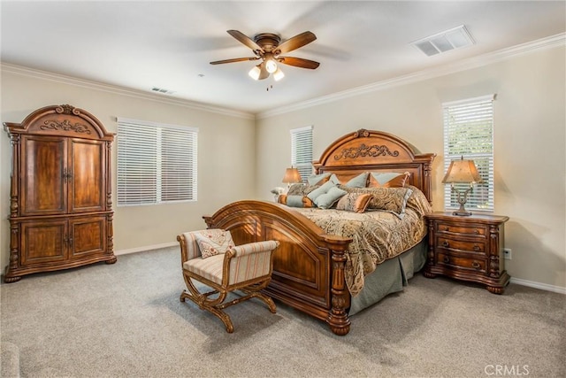 carpeted bedroom featuring ceiling fan and ornamental molding