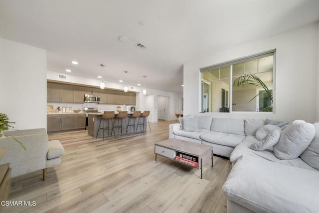 living room featuring light hardwood / wood-style flooring