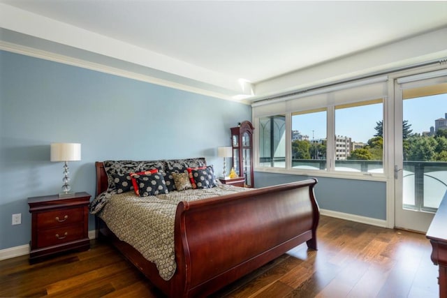 bedroom with dark wood-type flooring