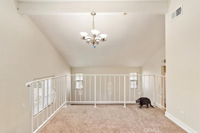 bonus room featuring carpet flooring, vaulted ceiling with beams, a healthy amount of sunlight, and a notable chandelier