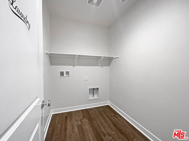 washroom with dark wood-type flooring and hookup for a washing machine