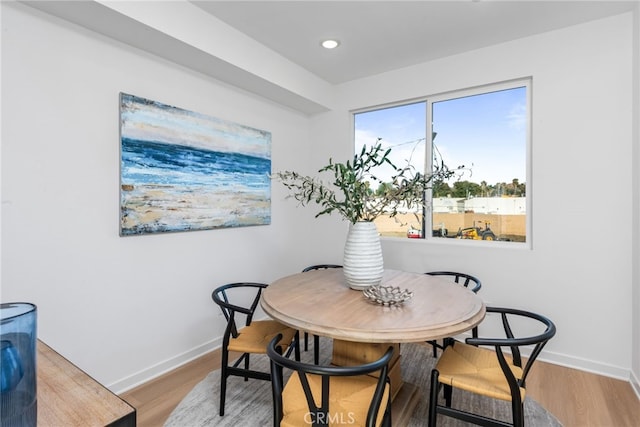 dining room with light hardwood / wood-style floors