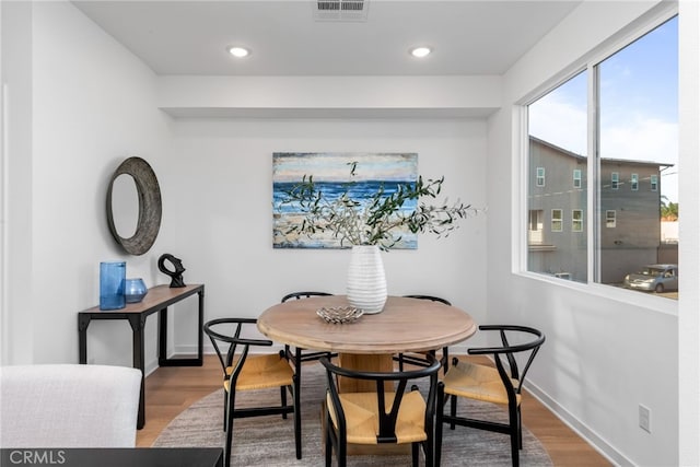 dining room featuring hardwood / wood-style flooring