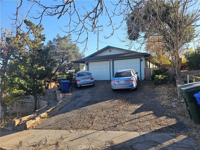 view of home's exterior with a garage