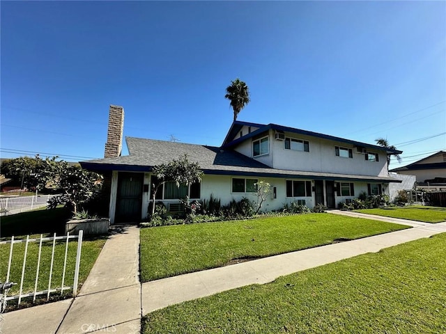 view of front of property with a front yard