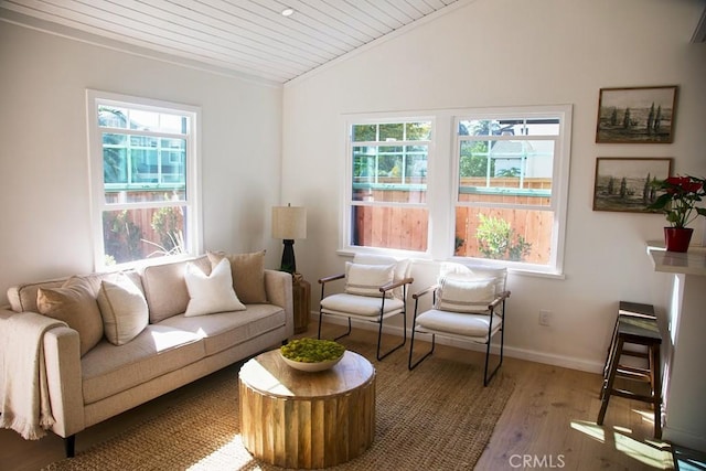 living room with wooden ceiling, wood-type flooring, and vaulted ceiling